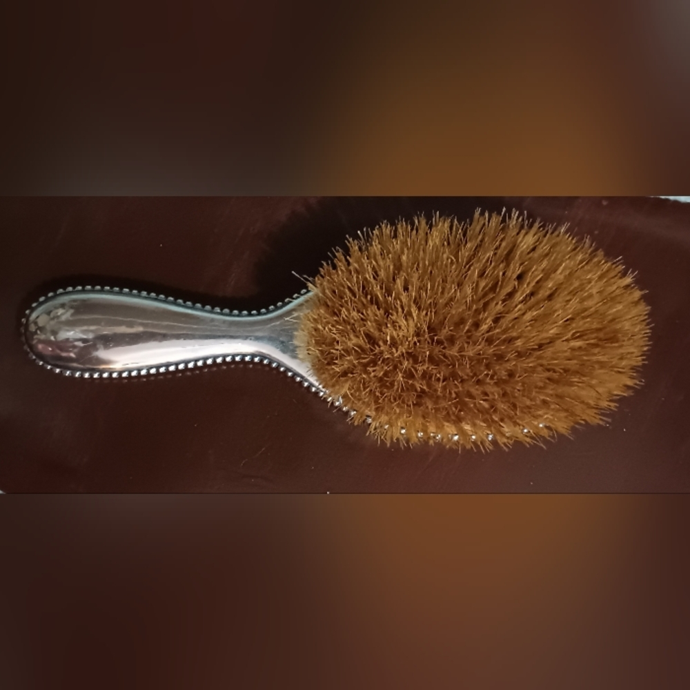 Antique hair brush.